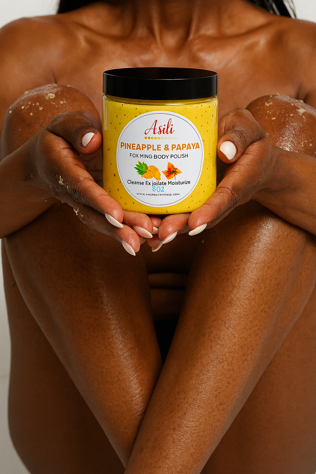 Woman holding pineapple papaya sugar body scrub for smooth glowing skin
